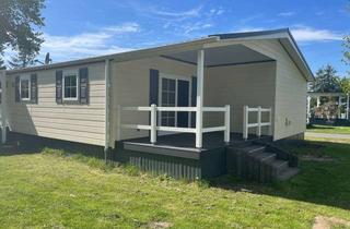 Wohnung kaufen in 63517 Rodenbach, Wohlfühlen auf ganzer Fläche – Mobilheim mit 4 Zimmern und Terrasse