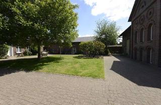 Wohnung kaufen in Wevelinghovener Straße 14, 41515 Grevenbroich, Charmante Erdgeschosswohnung mit Sonnenterrasse und Gartenanteil in umgebauter Scheune