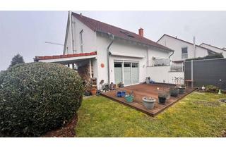 Doppelhaushälfte kaufen in 56410 Montabaur, Gepflegte Doppelhaushälfte mit Eckgrundstück, Carport und Kamin in bevorzugter Wohnlage in Horressen