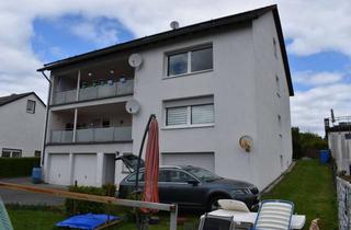 Anlageobjekt in 57583 Nauroth, Saniertes Mehrfamilienhaus mit Vollwärmedämmung, Luft-Wärmepumpen-Heizung, Isolierverglas.,Garagen,