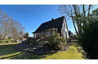 Einfamilienhaus kaufen in 25436 Heidgraben, Einfamilienhaus mit viel Potenzial auf großem Grundstück inkl. Vollkeller und Garage