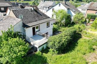 Einfamilienhaus kaufen in 56254 Müden, Renovierungsbedürftiges Einfamilienhaus mit Balkon, Terrasse, Innenhof, Garage und gro