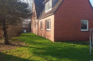 Einfamilienhaus kaufen in Moltkestraße, 25358 Hohenfelde, freistehend modernisiertes Einfamilienhaus mit Einliegerwohnung Bodenheizung 2 Kachelöfen Hohenfelde