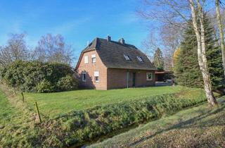 Haus kaufen in 26203 Wardenburg, Wardenburg - 6248 - PREIS PASST! Idyllisch gelegenes Wohnhaus mit Nebengebäude und ca. 1,3 ha Grünland.
