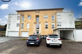 Wohnung kaufen in 66636 Tholey, Vermietete Dreizimmerwohnung im 2. Obergeschoss mit Terrasse und Stellplatz