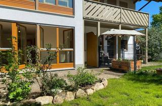 Wohnung kaufen in 85640 Putzbrunn, Einladende 2,5 Zimmer Gartenwohnung mit durchdachtem Grundriss in zentraler Lage von Putzbrunn