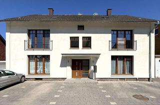 Mehrfamilienhaus kaufen in 59597 Erwitte, Modernisiertes Mehrfamilienhaus mit 6 Wohneinheiten, Stellplätzen, Garagen und großzügigem Garten