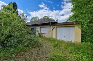 Einfamilienhaus kaufen in 34385 Bad Karlshafen, Modernisierungsbedürftiges Einfamilienhaus mit Garage in guter und idyllischer Wohnlage
