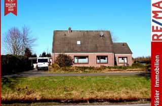 Haus kaufen in 26842 Ostrhauderfehn, 2 Häuser - ein Preis in Ostrhauderfehn * Kanallage * 1 Haus vermietet * 1 Haus sanierungsbedürftig *