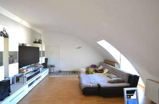 Wohnung kaufen in 82110 Germering, Außergewöhnliche 2-Zimmer-Dachgeschosswohnung im Herzen von Germering