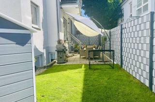 Wohnung kaufen in 61118 Bad Vilbel, Geräumige und modernisierte 4-Zimmer-Wohnung mit eigenem Garten nähe Kurpark