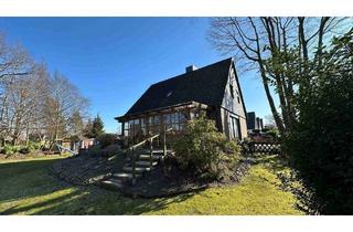 Einfamilienhaus kaufen in 25436 Heidgraben, Heidgraben - Einfamilienhaus mit viel Potenzial auf großem Grundstück inkl. Vollkeller und Garage
