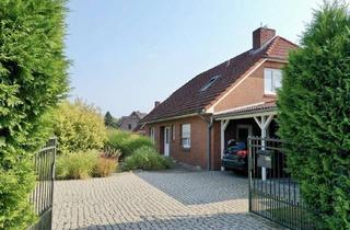 Einfamilienhaus kaufen in 27419 Wohnste, Einfamilienhaus mit gepflegtem Garten und Doppelcarport
