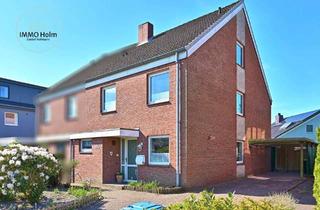 Doppelhaushälfte kaufen in 25488 Holm, Doppelhaushälfte in Holm mit schönem Garten und viel Platz - Ideal für Familien!