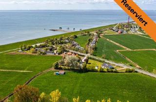 Grundstück zu kaufen in 26969 Butjadingen, Großzügiges Baugrundstück in Butjadingen: 3.938 m² am Jadebusen, erschlossen und vielseitig nutzbar