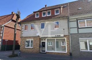 Gewerbeimmobilie kaufen in 37186 Moringen, Vermietetes Reihenendhaus mit Gewerbeeinheit im Stadtzentrum von Moringen