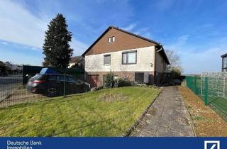 Einfamilienhaus kaufen in 30826 Garbsen, Garbsen - Einfamilienhaus mit 2 Garagen & Wärmepumpe auf großem Grundstück