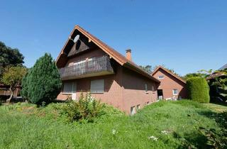 Haus kaufen in 33154 Salzkotten, Zweifamilienhaus mit großem Garten und zusätzlichem Baupotenzial in Salzkotten-Niederntudorf