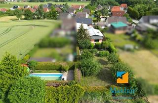 Doppelhaushälfte kaufen in 18510 Wittenhagen, Doppelhaushälfte mit idyllischem Garten, Hof und Nebengebäuden.