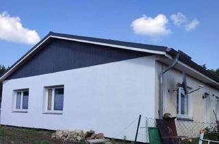 Einfamilienhaus kaufen in 25557 Bendorf, Ebenerdiges Einfamilienhaus mit Einliegerwohnung und Pelletofen, modernisiert, toll ausgestattet !!!