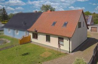 Anlageobjekt in Klein Below 10, 17391 Neetzow, Sofort wohlfühlen: 5-Zi.-DHH mit Märchengarten, Nebengelass und Garage in Neetzow-Liepen