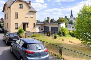 Haus kaufen in 56579 Rengsdorf, Rengsdorf - 2-Familienhaus mit Ausbaupotenzial durch ehemalige Gewerbeeinheit