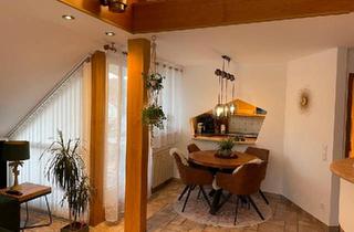 Wohnung kaufen in 72631 Aichtal, Aichtal - Offen gestaltete DG-Wohnung mit Kamin & Stellplatz