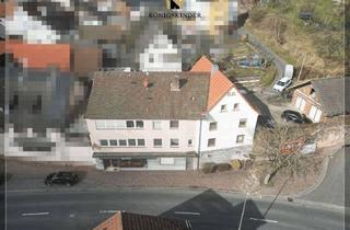 Haus kaufen in 63875 Mespelbrunn, Neuer Vermieter gesucht: Vier Wohnungen u. einen kl. Laden, Garagen in drei Gebäude auf gr. Grundst.