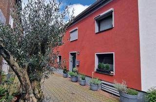 Haus kaufen in Sankt-Nikolaus-Straße, 47495 Rheinberg, Modernisiertes Reihenmittelhaus mit 71 m² Wohnfläche im idyllischen Ortskern von Orsoy!
