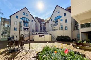 Wohnung kaufen in Sindelfinger Str. 18, 71069 Sindelfingen, Charmante, lichterfüllte Dachgeschosswohnung direkt im Zentrum von Maichingen