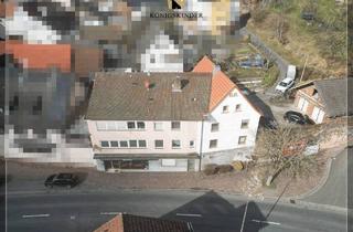 Haus kaufen in 63875 Mespelbrunn, Mespelbrunn - Neuer Vermieter gesucht: Vier Wohnungen u. einen kl. Laden, Garagen in drei Gebäude auf gr. Grundst.