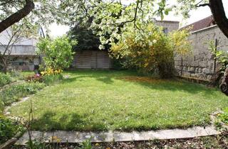 Wohnung kaufen in 65479 Raunheim, Raunheim - Eine grüne Oase mitten in der Stadt - Charmante Altbauwohnung mit Sonnenterrasse, Garten & Stellplatz