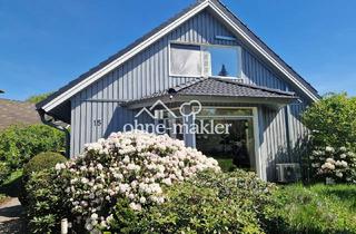Haus kaufen in 25488 Holm, Leben im Grünen - Architekten-Holzhaus in bester Lage Holms - ohne Courtage