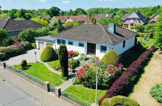 Haus kaufen in 21447 Handorf, Bungalow zum Wachküssen auf idyllischem Grundstück in begehrter Lage von Handorf