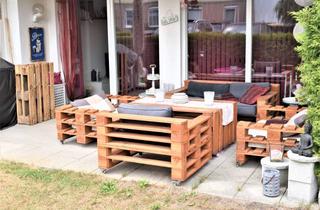 Anlageobjekt in Am Marktplatz, 65232 Taunusstein, Vermietete, moderne Dreizimmer-Gartenwohnung in zentraler Lage von Wehen