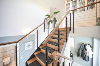 Einfamilienhaus kaufen in 97295 Waldbrunn, Waldbrunn - A+ Effizienz: Modernes Traumhaus mit separater PraxisBüroEinliegerwohnung