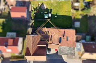 Haus kaufen in 36214 Nentershausen, Nentershausen - Großes Wohn- und Geschäftshaus mit 3 Garagen und 3 PKW-Stellplätzen in Nentershausen.