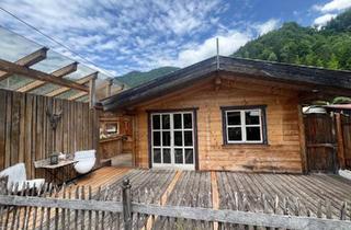 Haus kaufen in 83246 Unterwössen, Unterwössen - Hütte im Blockbau 12cm massiv zur Dauernutzung auf Campinglatz