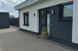 Wohnung kaufen in 49413 Dinklage, Dinklage - Exklusive Bungalow Wohnung mit großem Garten