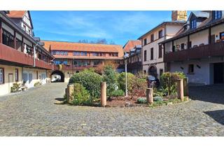 Wohnung kaufen in 61194 Niddatal, NIDDATAL-ASSENHEIM: Charmante 3 Zi.-Wohnung im historischen Ambiente des Fronhofs!