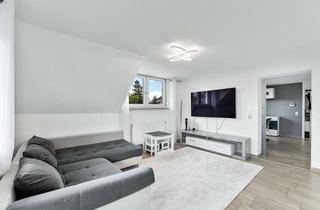 Wohnung kaufen in 72525 Münsingen, Moderne Dachgeschosswohnung mit großem Hobbyraum und Garage!