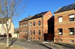 Doppelhaushälfte kaufen in Wittenberger Straße, 06779 Raguhn, Ideal für Familien: gemütliche Doppelhaushälfte in Raguhn mit großem Garten und idyllischem Teich