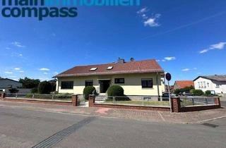 Einfamilienhaus kaufen in 63486 Bruchköbel, Traumhaftes Einfamilienhaus mit Wintergarten 210 m² Wohnfläche auf großzügigem 850 m² Grundstück