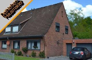 Doppelhaushälfte kaufen in 25746 Heide, Verkauf einer teilmodernisierten Doppelhaushälfte in ruhiger, gefragter Wohnlage in Heide, Kreis Dit