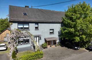 Mehrfamilienhaus kaufen in 57629 Dreifelden, Modernisiertes Mehrfamilienhaus mit Garten, Terrasse und Stellplätzen in ruhiger Lage