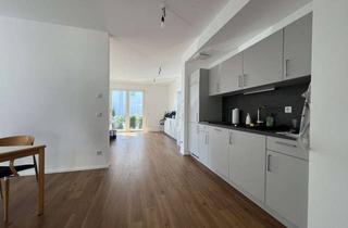 Gewerbeimmobilie kaufen in Berliner Straße, 55435 Gau-Algesheim, Für Kapitalanleger: Langfristig vermietete Neubau-Büroeinheit mit optimaler Anbindung.