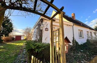 Doppelhaushälfte kaufen in 39387 Oschersleben, Doppelhaushälfte mit Garage und großem Gartengrundstück