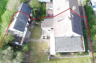 Doppelhaushälfte kaufen in 39387 Oschersleben, Doppelhaushälfte mit Garage und großem Gartengrundstück