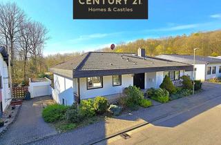 Haus kaufen in 66280 Sulzbach, Attraktiver großer Bungalow mit ELW, Garten, 2 Garagen und Weiher in privilegierter Wohnlage