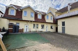 Anlageobjekt in 67574 Osthofen, Attraktives Mehrfamilienhaus mit Ladengeschäft und Entwicklungspotenzial in begehrter Lage